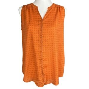 Carolina Belle Montreal small orange sleeveless button up blouse